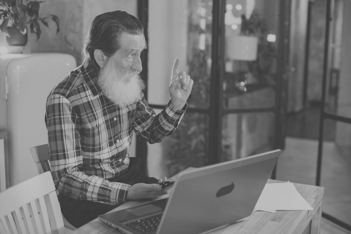 Professional analyzing financial charts and investment data on multiple screens